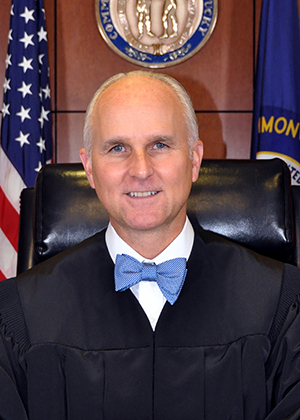 Official portrait of Judge Christopher McNeill.