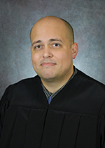 Official portrait of Judge Bolton Bevins. 