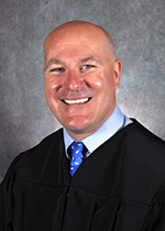 Official portrait of Judge Cameron J. Blau.  