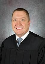 Official portrait of Judge Tyler Green. 