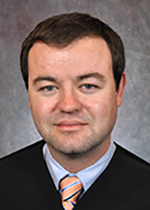 Official portrait of Judge Tommy R. May. 