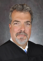 Official portrait of Judge Brent Hall.