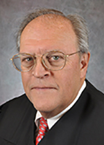 Official portrait of Judge Clint Harris.